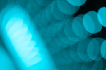 Blurred mosaic gradient fluid texture design. Abstract transformative teal color background with a bokeh effect. 