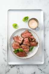 Cold roast beef with sauce