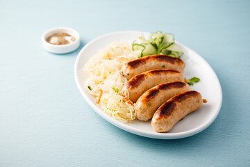 Homemade sausages with sauerkraut