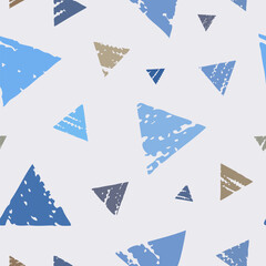 Scattered distressed triangles pattern in beige and blue tones ideal for calm companion design for home bedding