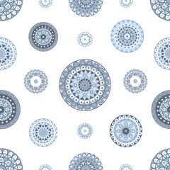Seamless pattern of repeating stylized mandalas or floral motifs in various shades of blue and gray on white background. Flat vector design with clear lines for textiles, covers, decor and web design.