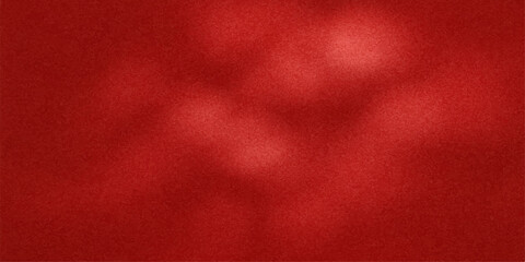 Abstract textured background with soft blurred red and pink hues and subtle light effects