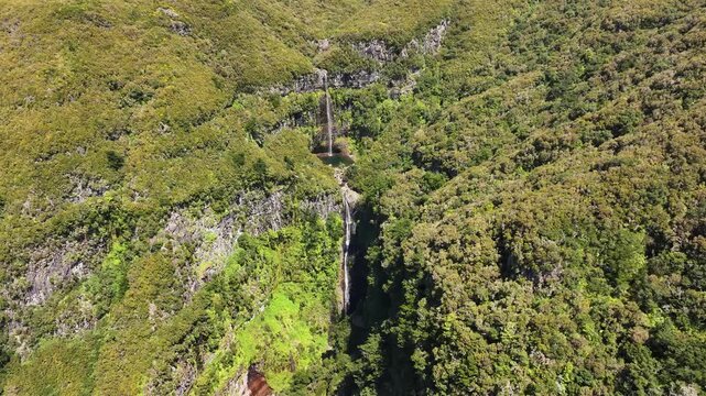 Scenic Risco falls in lush landscape of Rabacal area on Madeira island, aerial