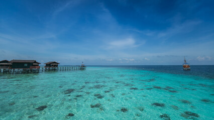 Tropical Island Seascape Of Pom Pom Island In Semporna Malaysia