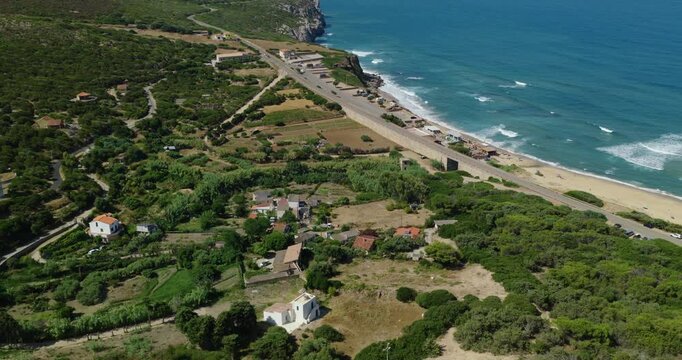 Aerial view of Buggerru coastline, Sardinia, peaceful coastal Italian village