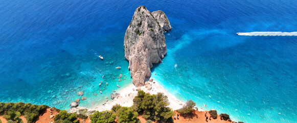 Aerial drone ultra wide panoramic photo of scenic small islet of Mizithres in Keri area forming...