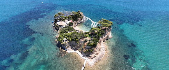 Aerial drone ultra wide panoramic photo of scenic small islet and sandy beach of Cameo in bay of...