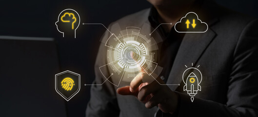 Businessman uses a futuristic digital interface displaying icons of AI, cloud computing, cybersecurity, and innovation, representing digital transformation and modern technology.