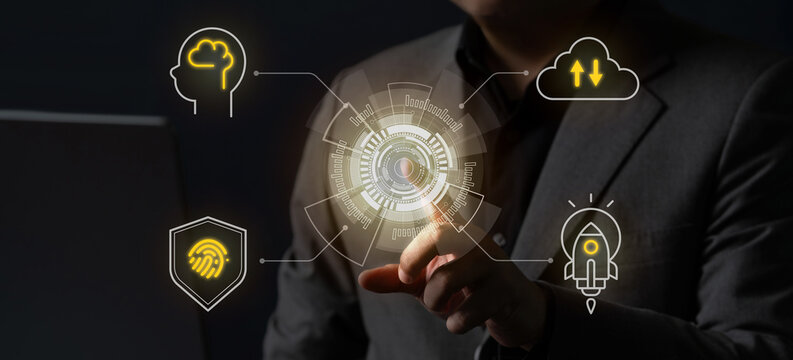 Businessman uses a futuristic digital interface displaying icons of AI, cloud computing, cybersecurity, and innovation, representing digital transformation and modern technology.