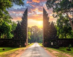 Tropical gateway at sunset. Lush greenery, ancient stone archway