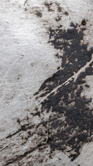 old aluminum sheet with burnt marks from the pan