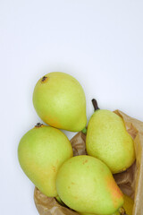 pears on a white background and vertical shot
