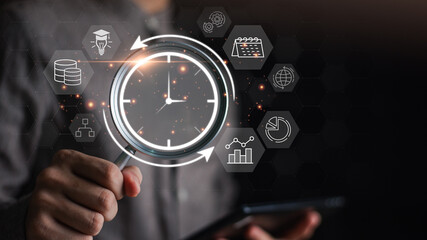 A person using a magnifying glass to focus on a clock with surrounding icons of data, planning, and global connectivity, symbolizing digital time management, analysis, and strategic optimization.