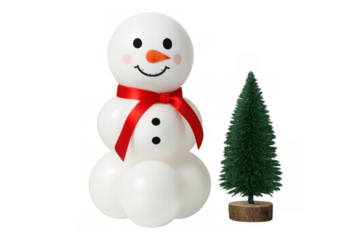 Balloon snowman wearing red ribbon next to christmas tree preparing for winter holiday decorations