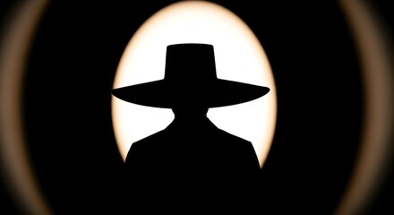 Mysterious figure in a wide brimmed hat silhouetted against a bright light