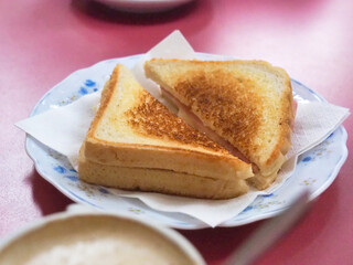 bread with butter, cheese and ham