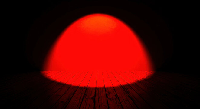 Bright red led light emitting diode glowing in darkness