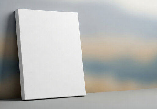 Mockup of a blank book with a white cover against a beautiful sunset sky background. An inspiring and minimalist template for a book cover, journal, or portfolio.