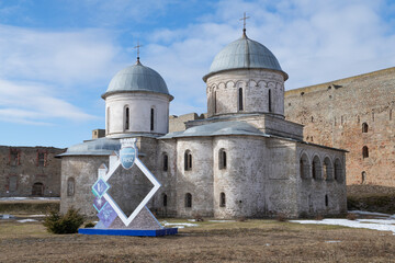 At the ancient temples of the Ivangorod fortress on a March day