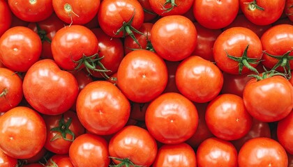 Close-up of ripe red tomatoes with green stems