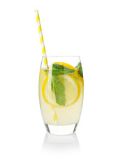 Refreshing lemonade with mint and fruit slices in glass isolated on white