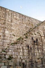 old medieval stone wall and stair with blue sky, constantinople, istanbul
