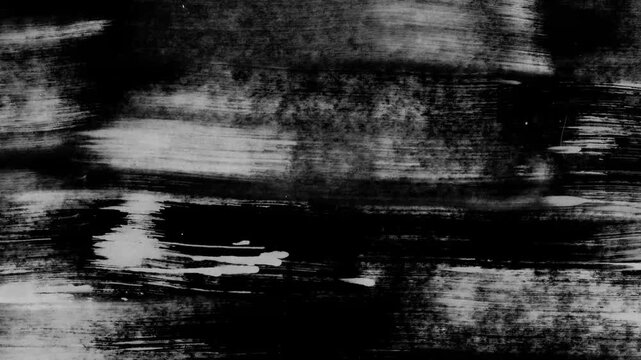 Abstract paint texture motion. Black and white grunge brush strokes background animation. Rough monochrome graphic element.