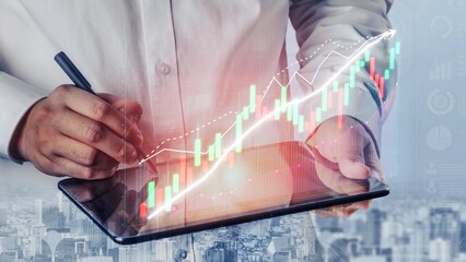 A business professional uses a digital tablet to analyze financial data with a dynamic graph overlay, representing market trends and growth strategies for success. Copula