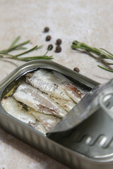 Overhead view of open sardine tin, great source of daily protein intake	
