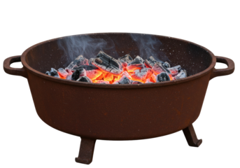 Rustic cast iron fire pit with glowing embers isolated, outdoor heating appliance for camping and backyard use