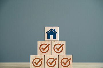 Home buying checklist wooden blocks concept for real estate property investment and mortgage approval process
