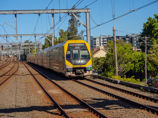 Passenger Train going through Summer Hill train station a suburban Sydney train Station NSW Australia