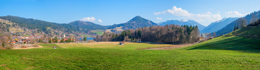 wide panorama Schliersee area, view from hiking trail to spa town and bavarian alps