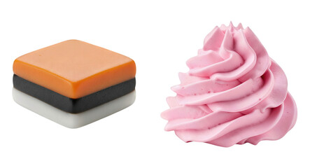 Layered orange black and white licorice candy next to a swirl of pink frosting or whipped cream isolated on a white background dessert concept sweet treat