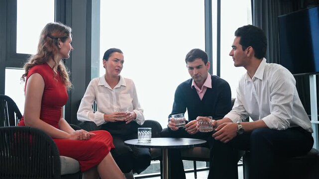 Group of businesspeople holding glass of drink discussing work at corporate networking event or business social gathering. Team communication, success, and strategy. Office meeting - Powered by Adobe
