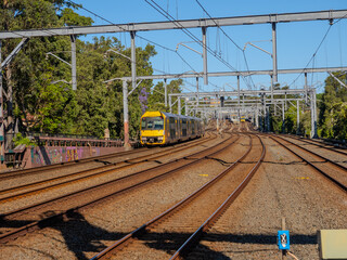 Passenger Train going through Summer Hill train station a suburban Sydney train Station NSW Australia