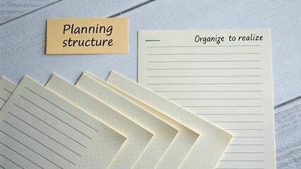 Creative planning and organization tools on a wooden surface for effective project management and idea development
