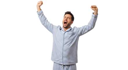 Man in pajamas stretching and yawning after waking up from a restful sleep, feeling refreshed and ready to start the day.