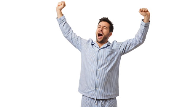 Man in pajamas stretching and yawning after waking up from a restful sleep, feeling refreshed and ready to start the day.