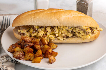  scramble egg and sausage   sub with house fries