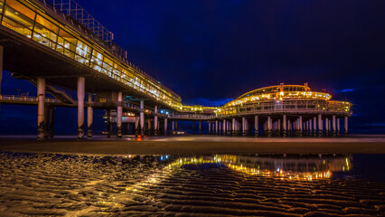Fototapeta premium The Ferris Wheel and the pier in Scheveningen, the Hague, Netherlands