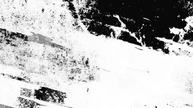 The texture of peeling paint on the wall, fast animation of a black and white background.