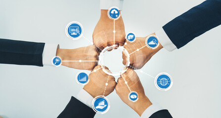 Office worker team stacking hand together symbolize successful group of business partnership and strong collective unity teamwork in community workplace in panoramic banner. Shrewd Amity