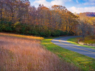 Meandering road surrounded by beautiful autumn foliat along the Blue Ridge Parkway in Virginia USA 