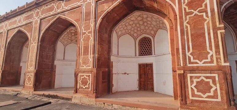 Architectural Symmetry and Detail: The Massive Red Sandstone Foundation and Geometric Design of Humayun's Tomb in Delhi, Showcasing Mughal Engineering