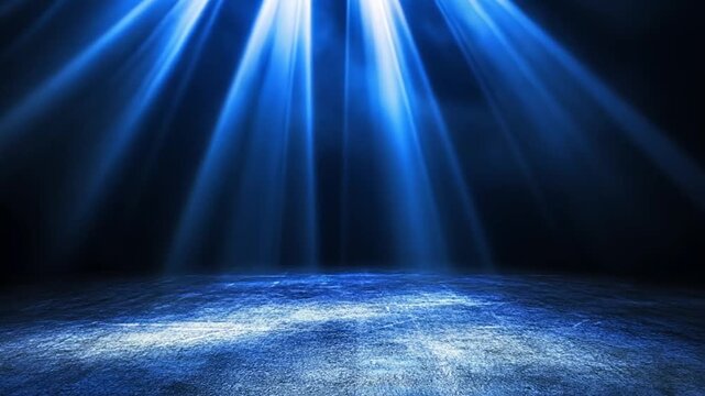 Mystical Blue Light Beams Illuminating a Dark Concrete Stage Floor