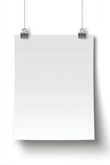 A white poster hanging from a wire