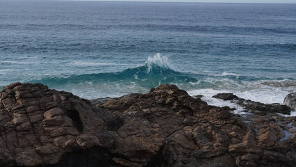 ocean and its power crashing against the cliffs