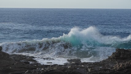 ocean and its power crashing against the cliffs