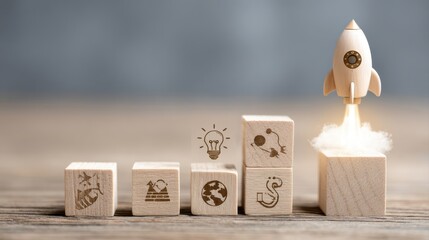 Rocket launching from wood cube with business icon, Start-up, Creativity, Big idea, Business goals management, Investment on new project to wealth, Company strategy target, Sustainable financial plan